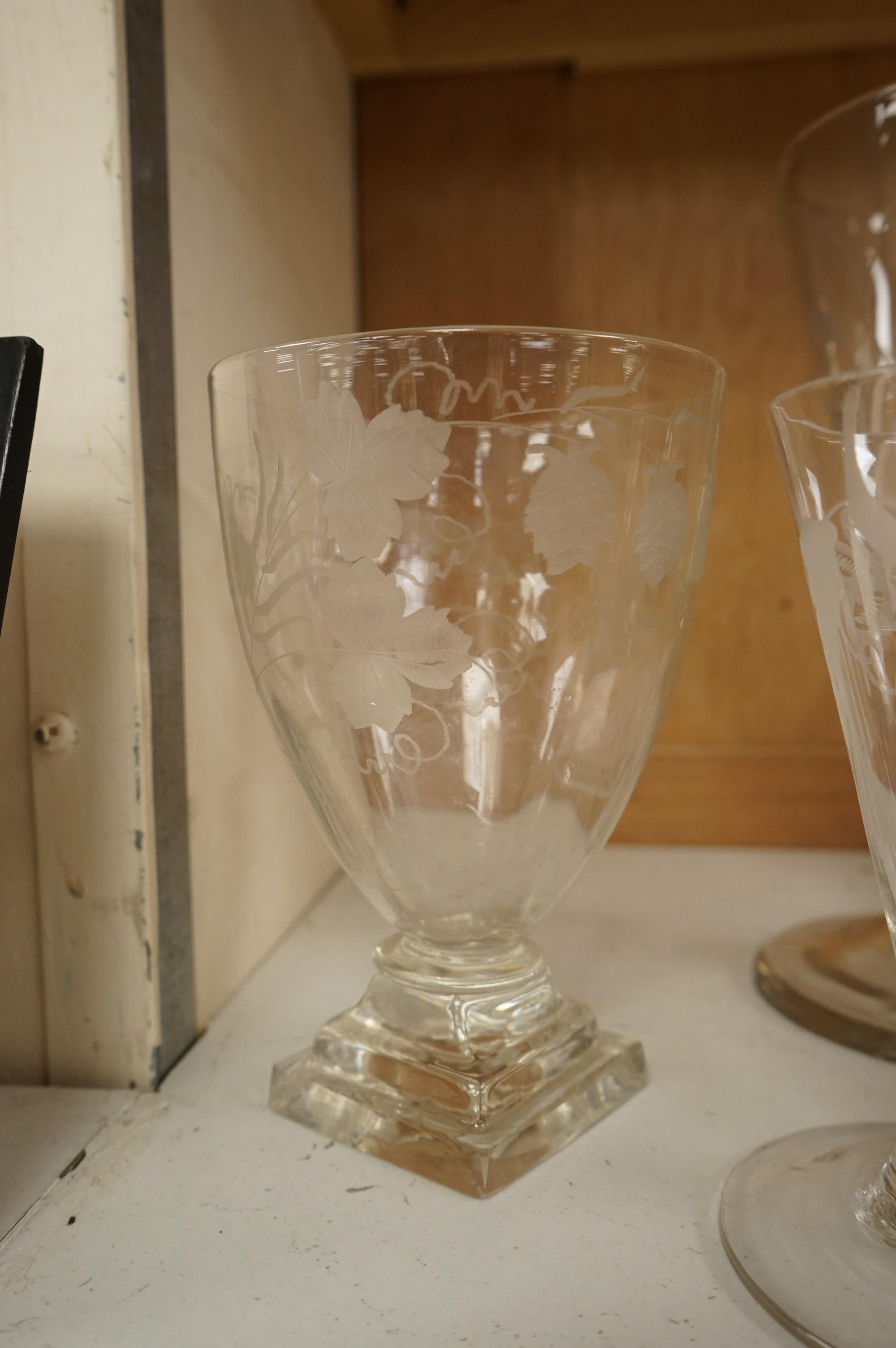 A group of 18th/early 19th century ale glasses, including two rummers, a large DSOT stem glass and two smaller funnel shaped glasses, largest 21cm high (5)